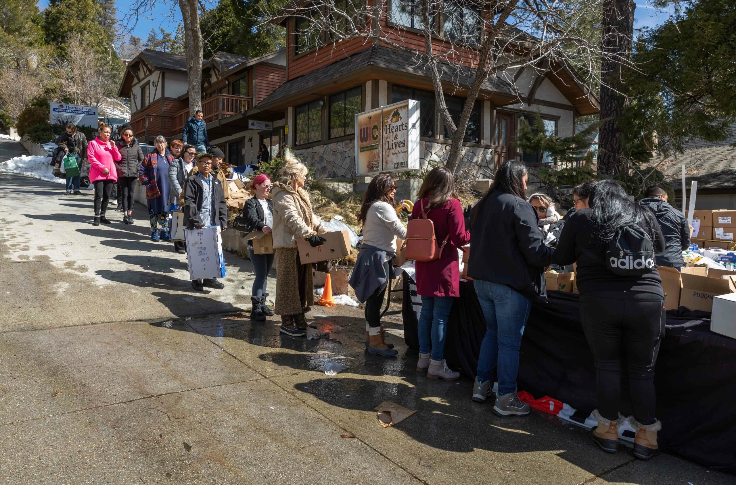 People lined up at food distribution